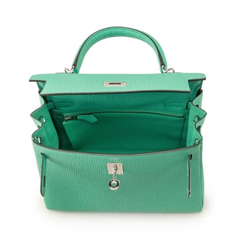 hermes kelly vert comics|Hermès Vert Comics Togo Kelly 25 Palladium Hardware, 2023.